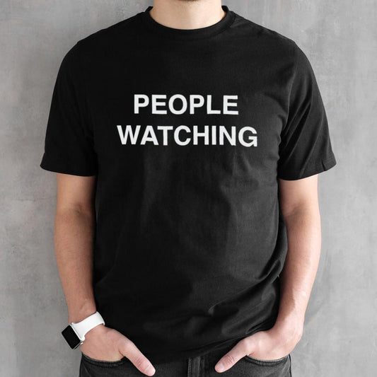 Dominic Fike wearing people watching shirts