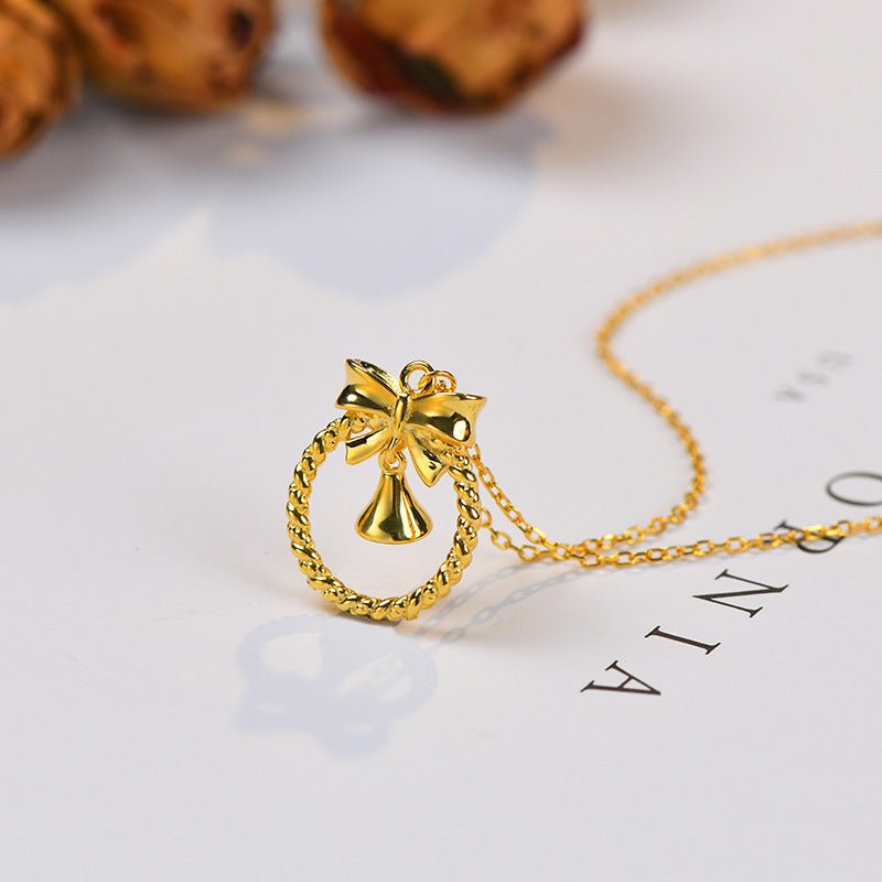 Bow and Bell Necklace