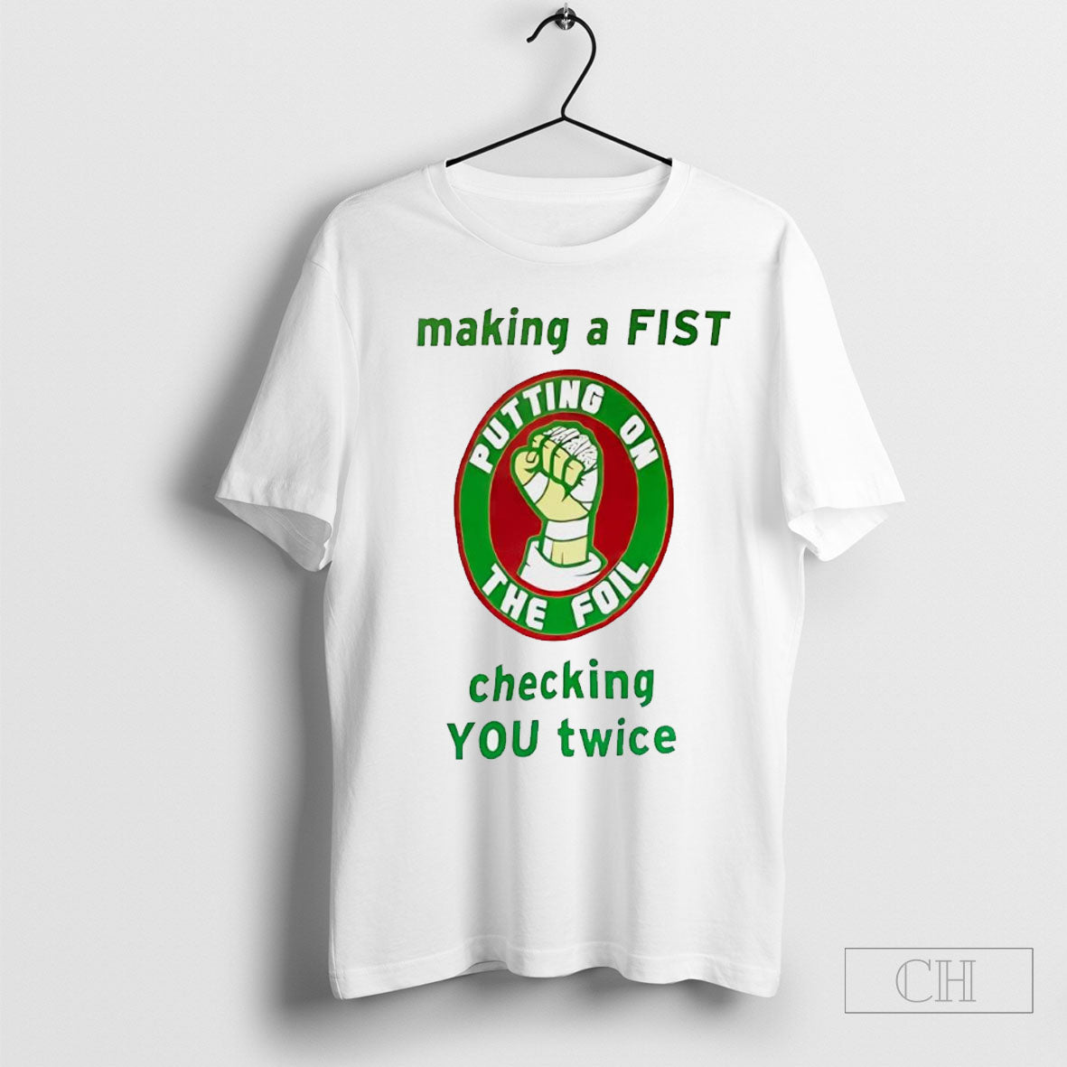 Putting On The Foil Making A Fist Checking You Twice Shirt