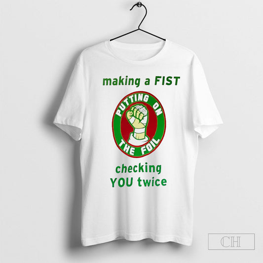 Putting On The Foil Making A Fist Checking You Twice Shirt